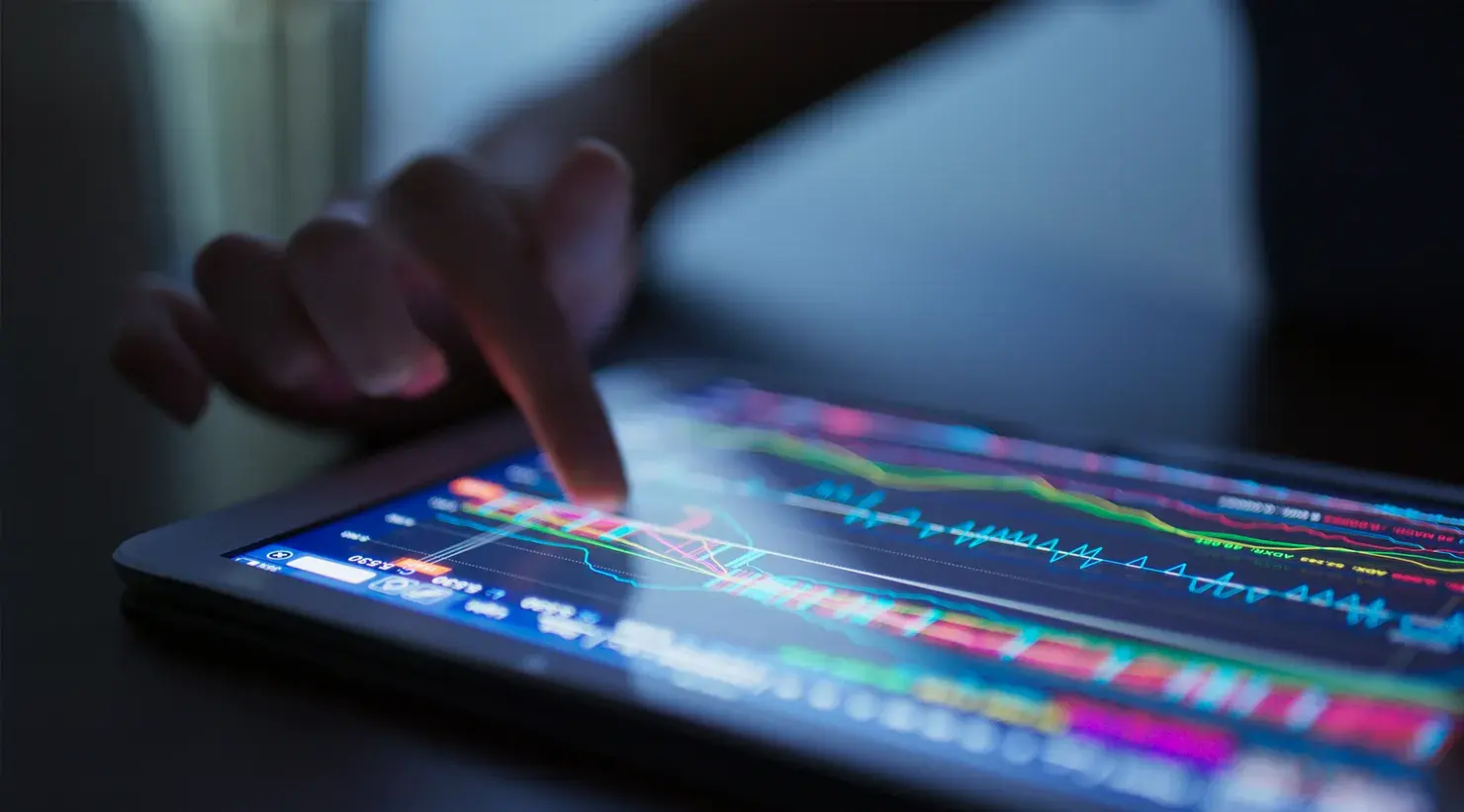 finger-touch-on-tablet-computer-with-stock-market
